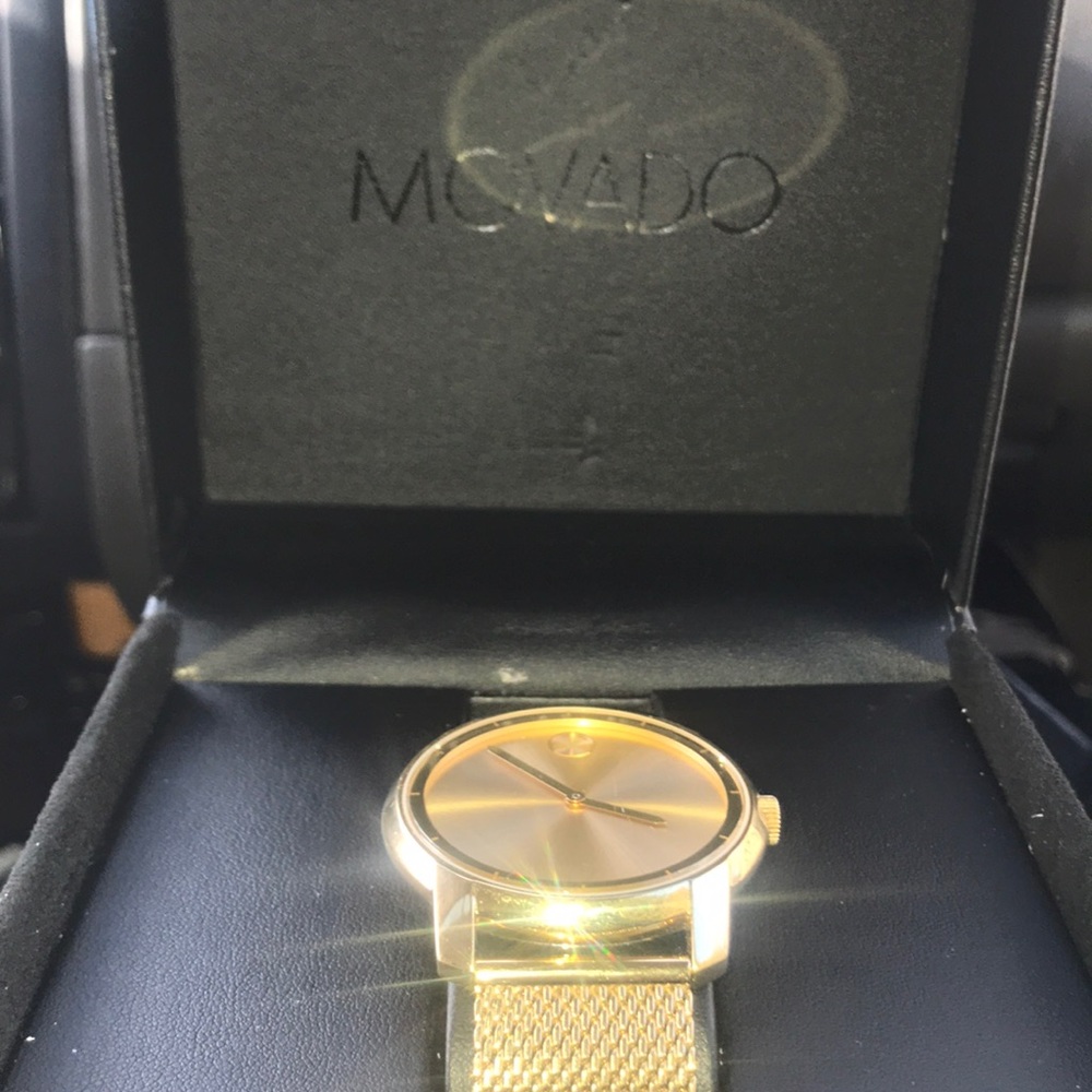 Gold Movado men’s watch